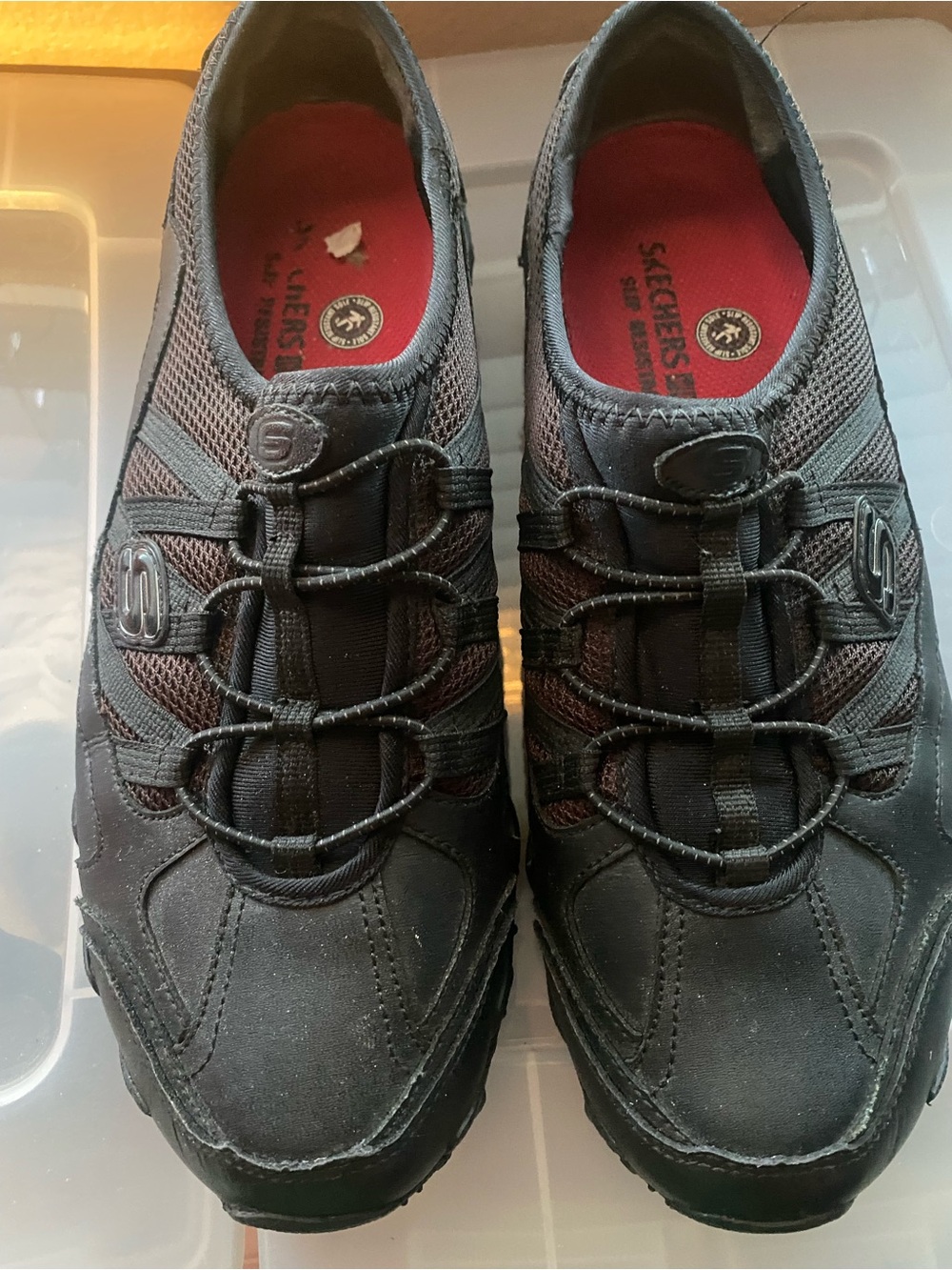 Women’s Skechers Black Slip-On Athletic Shoes with Red Insoles